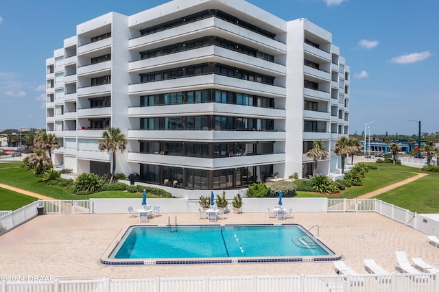 view of swimming pool with a patio