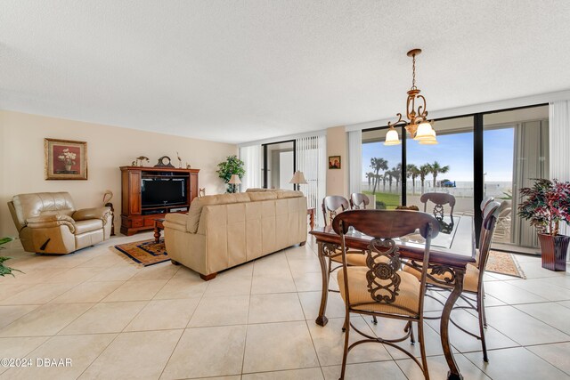 901 S Atlantic Ave Unit 102, Ormond Beach, FL 32176 - dining room with light tile patterned flooring