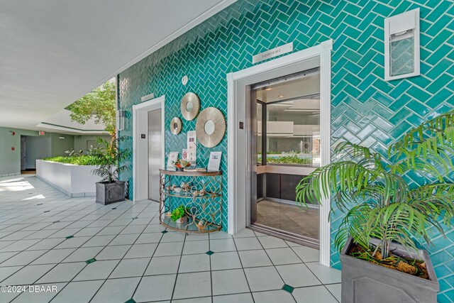 901 S Atlantic Ave Unit 102, Ormond Beach, FL 32176 - property entrance featuring elevator