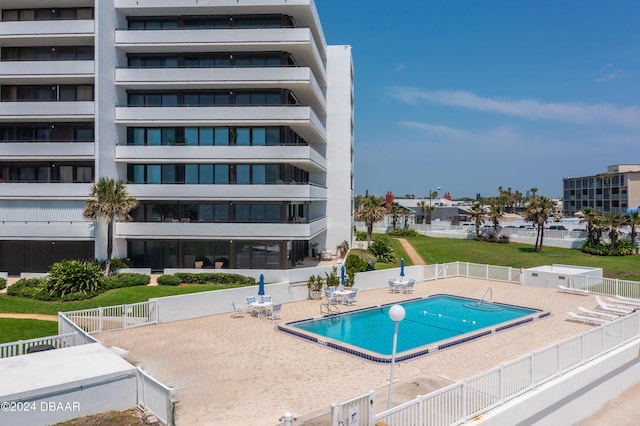 901 S Atlantic Ave Unit 102, Ormond Beach, FL 32176 - community pool with a patio