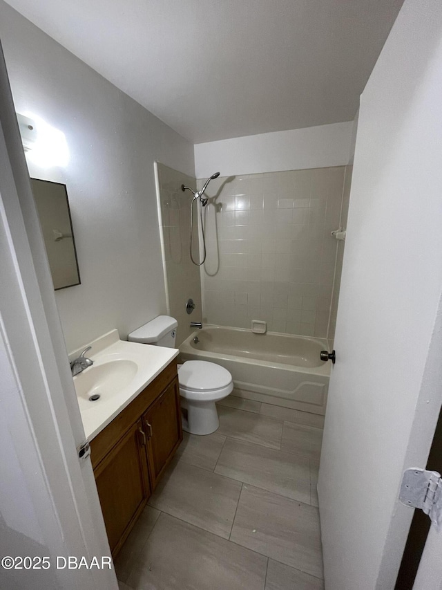 403 Banana Cay Dr Unit B, South Daytona, FL 32119 - bathroom featuring toilet, vanity, shower / tub combination, and tile patterned flooring
