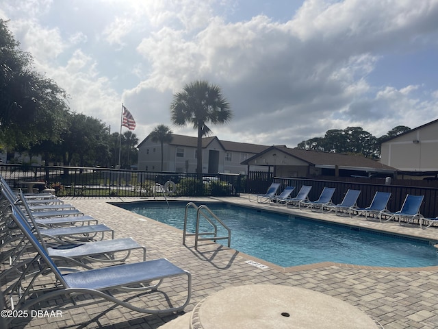 403 Banana Cay Dr Unit B, South Daytona, FL 32119 - community pool featuring a patio area