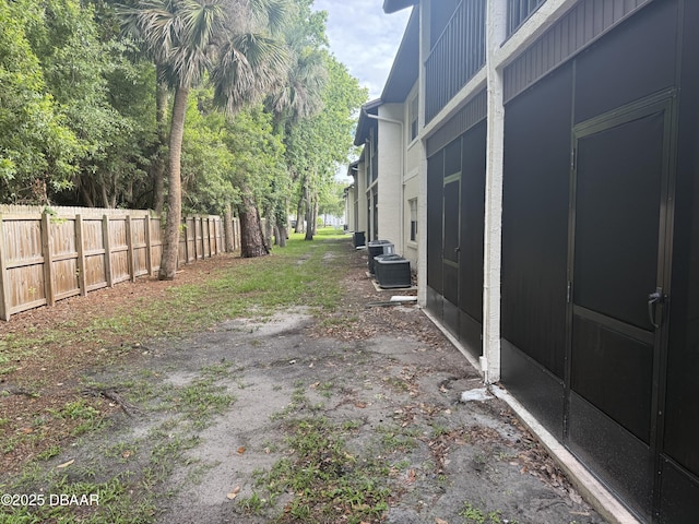 403 Banana Cay Dr Unit B, South Daytona, FL 32119 - view of yard featuring central air condition unit