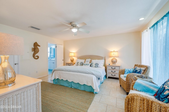 bedroom featuring light tile patterned floors, connected bathroom, recessed lighting, visible vents, and a ceiling fan