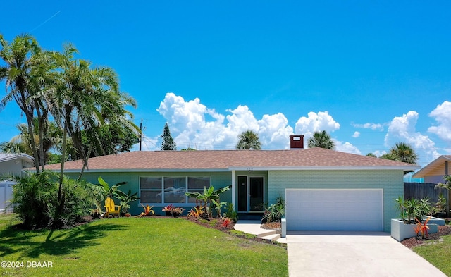 ranch-style home featuring brick siding, an attached garage, a front yard, fence, and driveway