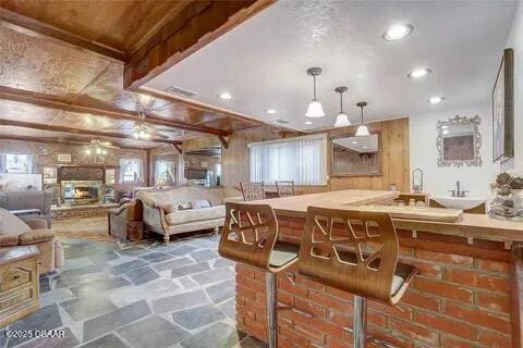 2144 Ridge Dr, Winter Park, FL 32792 - kitchen with healthy amount of natural light, ceiling fan, decorative light fixtures, and recessed lighting