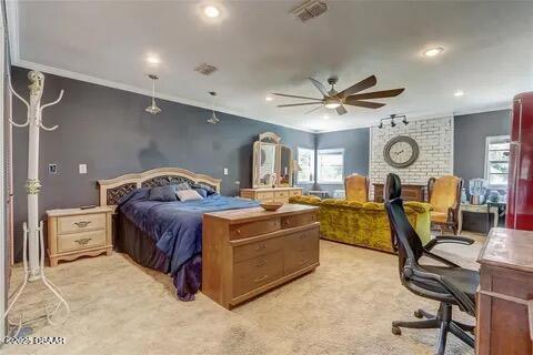 2144 Ridge Dr, Winter Park, FL 32792 - bedroom with light colored carpet, crown molding, recessed lighting, an office area, and a ceiling fan