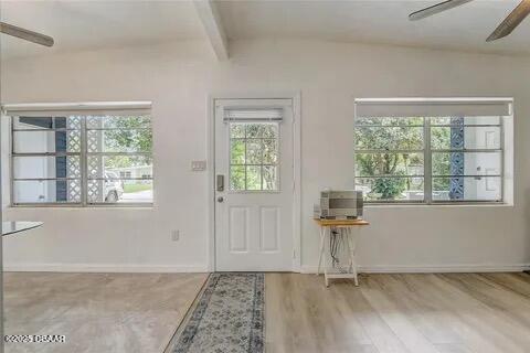 2144 Ridge Dr, Winter Park, FL 32792 - entryway featuring a ceiling fan, beamed ceiling, baseboards, and wood finished floors