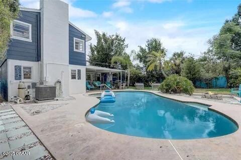 2144 Ridge Dr, Winter Park, FL 32792 - view of pool featuring a patio and central AC unit