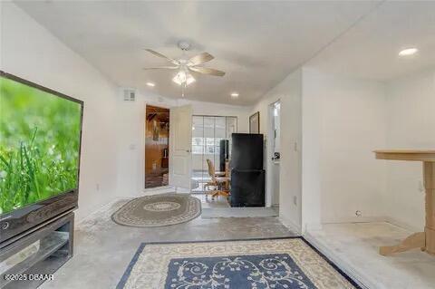 2144 Ridge Dr, Winter Park, FL 32792 - living area with finished concrete flooring, a ceiling fan, and recessed lighting