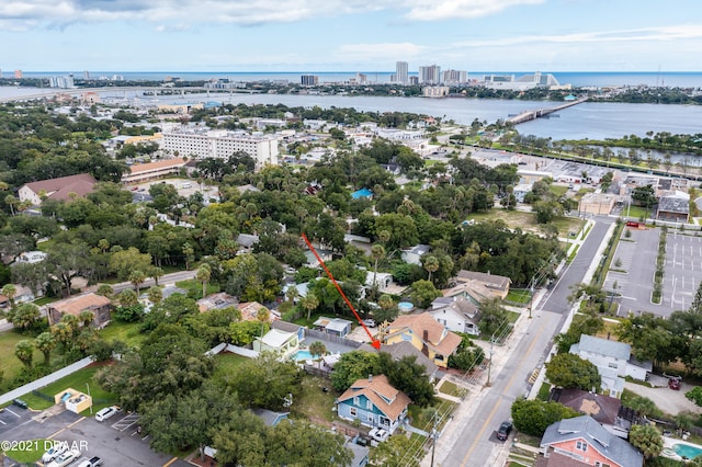 birds eye view of property featuring a water view