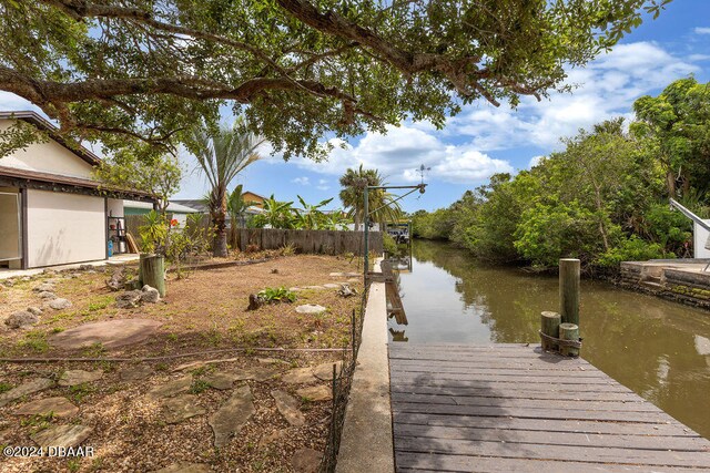 view of dock with a water view