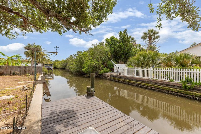 view of dock with a water view