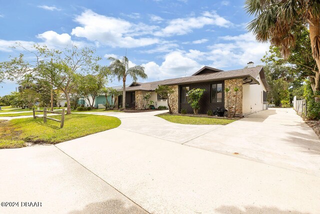 view of front of home with a front yard