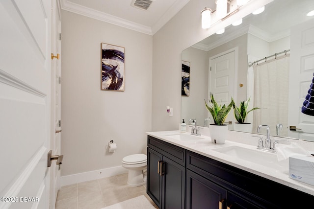 bathroom with ornamental molding, a sink, visible vents, and tile patterned floors