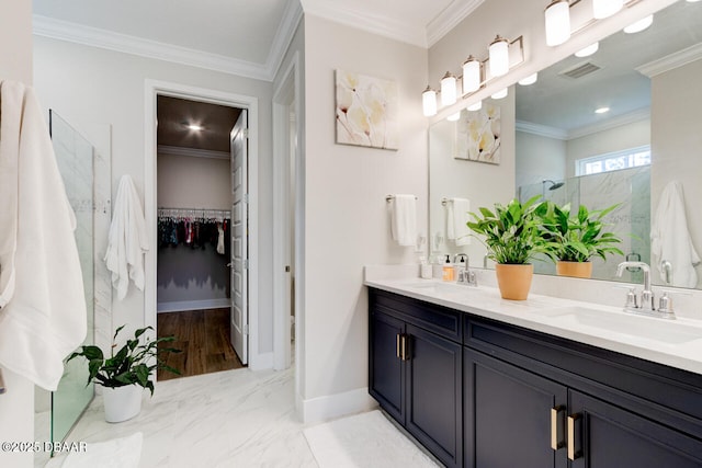 bathroom with crown molding, visible vents, a sink, and tiled shower