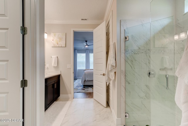 ensuite bathroom with marble finish floor, connected bathroom, a shower stall, and vanity