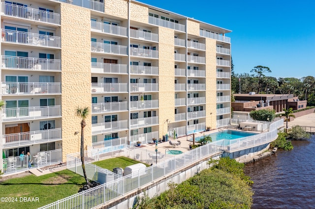 view of property with a water view