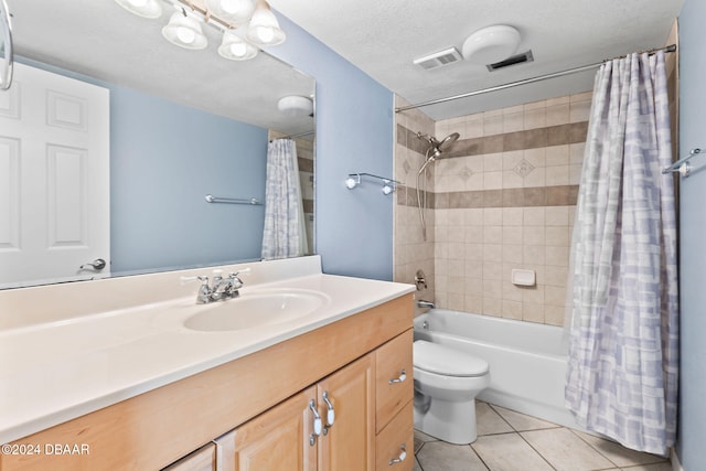 full bathroom with vanity, tile patterned flooring, toilet, shower / bathtub combination with curtain, and a textured ceiling