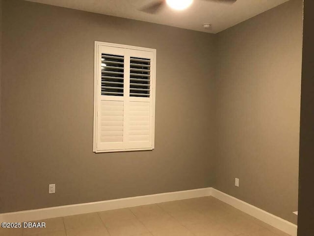 spare room featuring ceiling fan