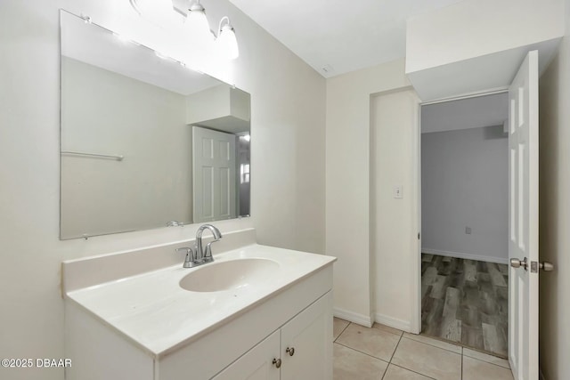 bathroom with vanity and tile patterned floors