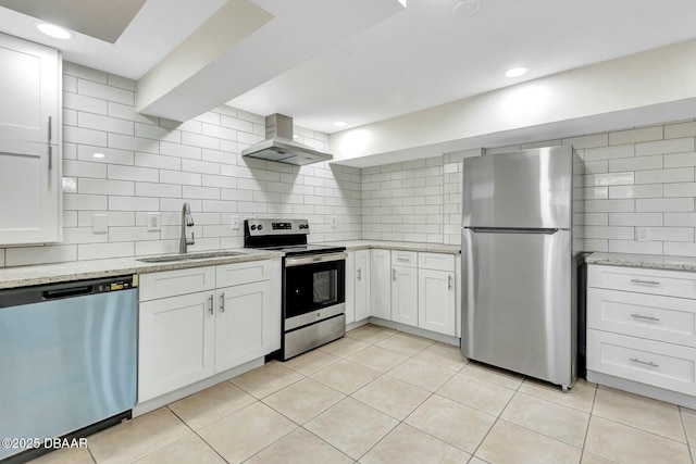 kitchen featuring sink, ventilation hood, stainless steel appliances, light stone countertops, and white cabinets