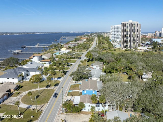 birds eye view of property featuring a water view