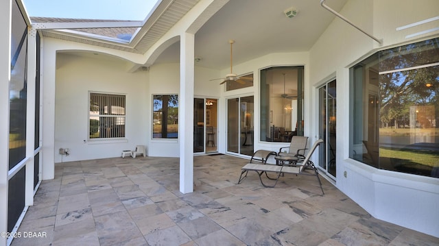 view of patio with ceiling fan