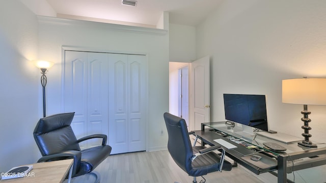 office area with light wood-type flooring