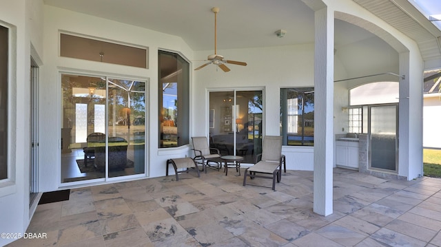 view of patio / terrace with ceiling fan