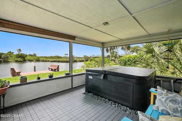 453 Palm Ave, Ormond Beach, FL 32174 - sunroom / solarium featuring a water view and a hot tub