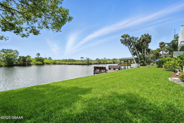 453 Palm Ave, Ormond Beach, FL 32174 - dock with a water view and a yard