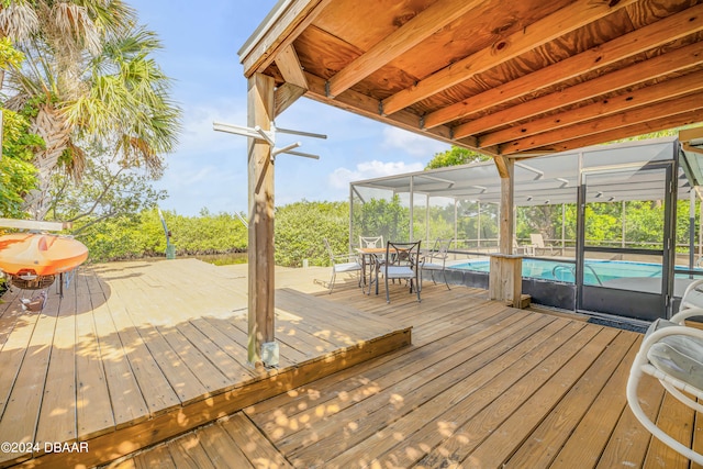 wooden terrace with glass enclosure