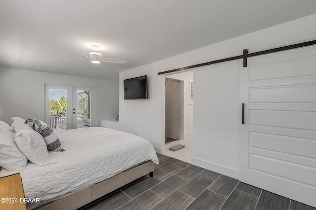 bedroom with ceiling fan, a barn door, access to exterior, and french doors