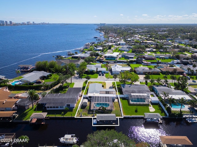 drone / aerial view with a water view