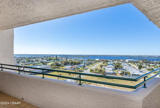 balcony featuring a water view