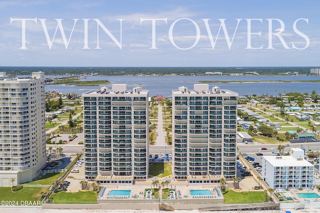 birds eye view of property featuring a water view