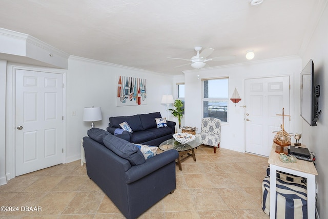 living room featuring crown molding and ceiling fan