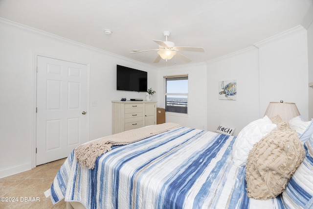 tiled bedroom with ceiling fan and crown molding