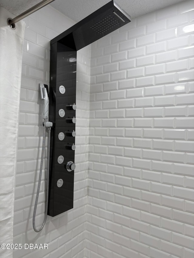 interior details featuring walk in shower