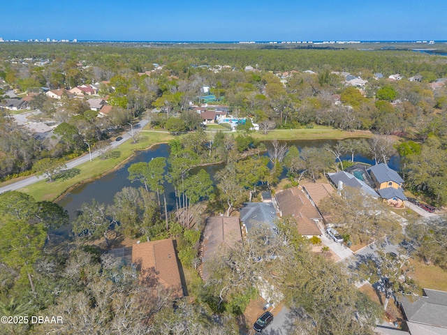 drone / aerial view featuring a residential view and a water view