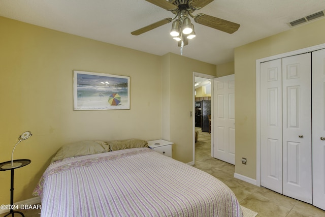 bedroom with a closet and ceiling fan