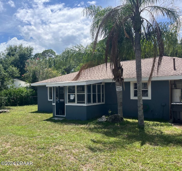 2852 Glenwood Ave, New Smyrna Beach, FL 32168 - exterior space featuring a front lawn