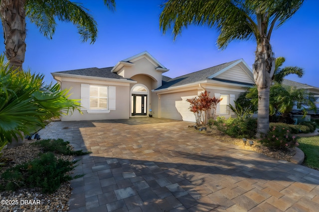 view of front of property featuring a garage