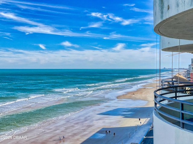 property view of water featuring a beach view