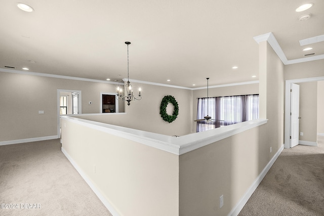 hallway featuring a wealth of natural light, light colored carpet, and ornamental molding