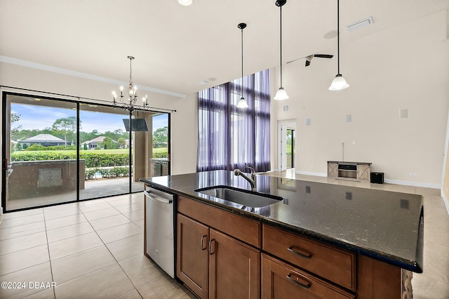 kitchen featuring decorative light fixtures, light tile patterned floors, an inviting chandelier, sink, and stainless steel dishwasher