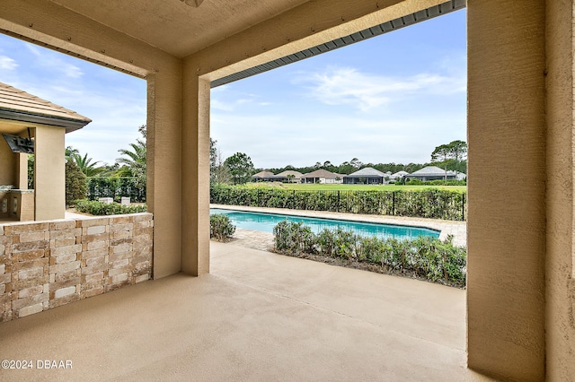 view of swimming pool featuring a patio