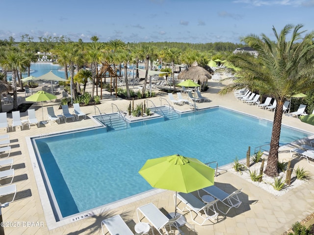 pool featuring a patio area