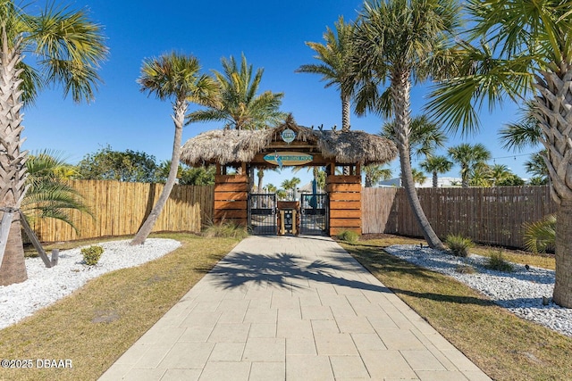 view of gate with fence